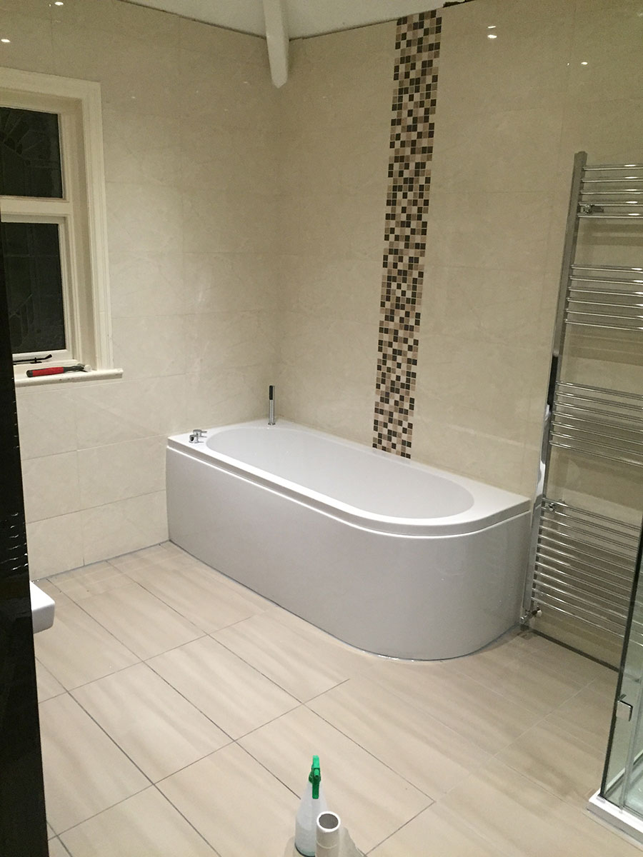 New tiled and fitted bathroom